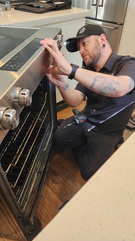 Gilbert Location Page Someone repairing a stove by Dynamic Appliance Repair