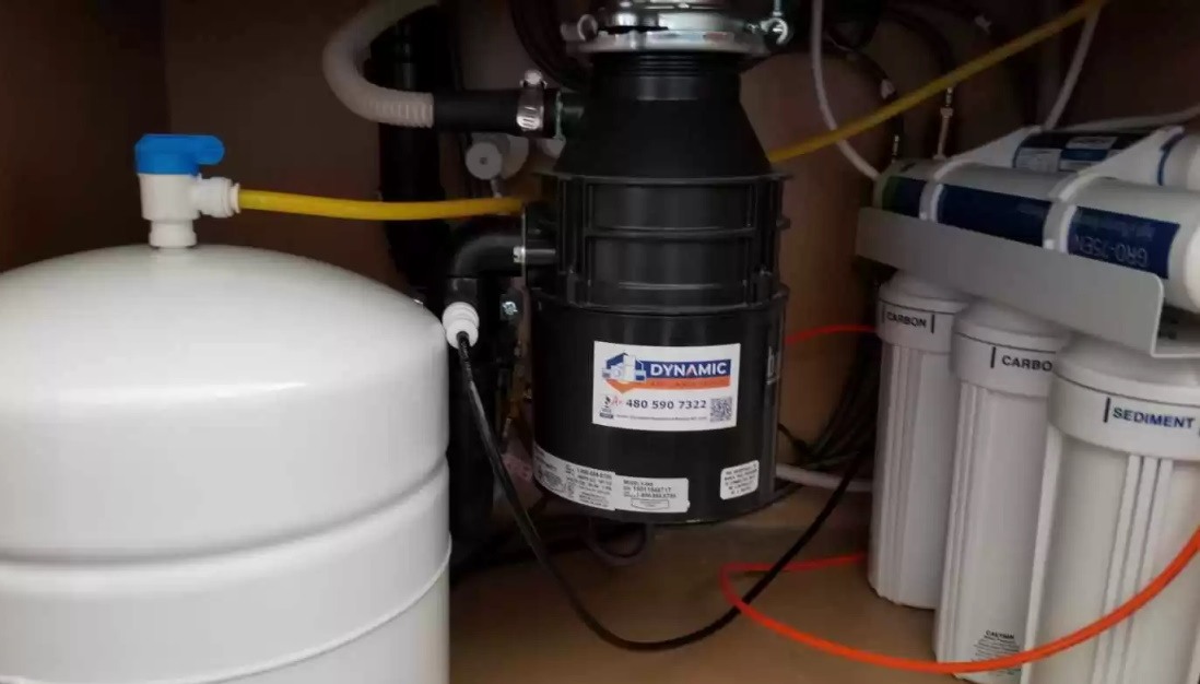 garbage disposal repair Sink with a water filter and dispenser, highlighting Garbage Disposal Repair services in Arizona<br />