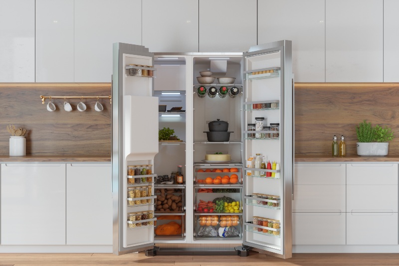 Organized modern refrigerator filled with fresh food in a kitchen in Arizona