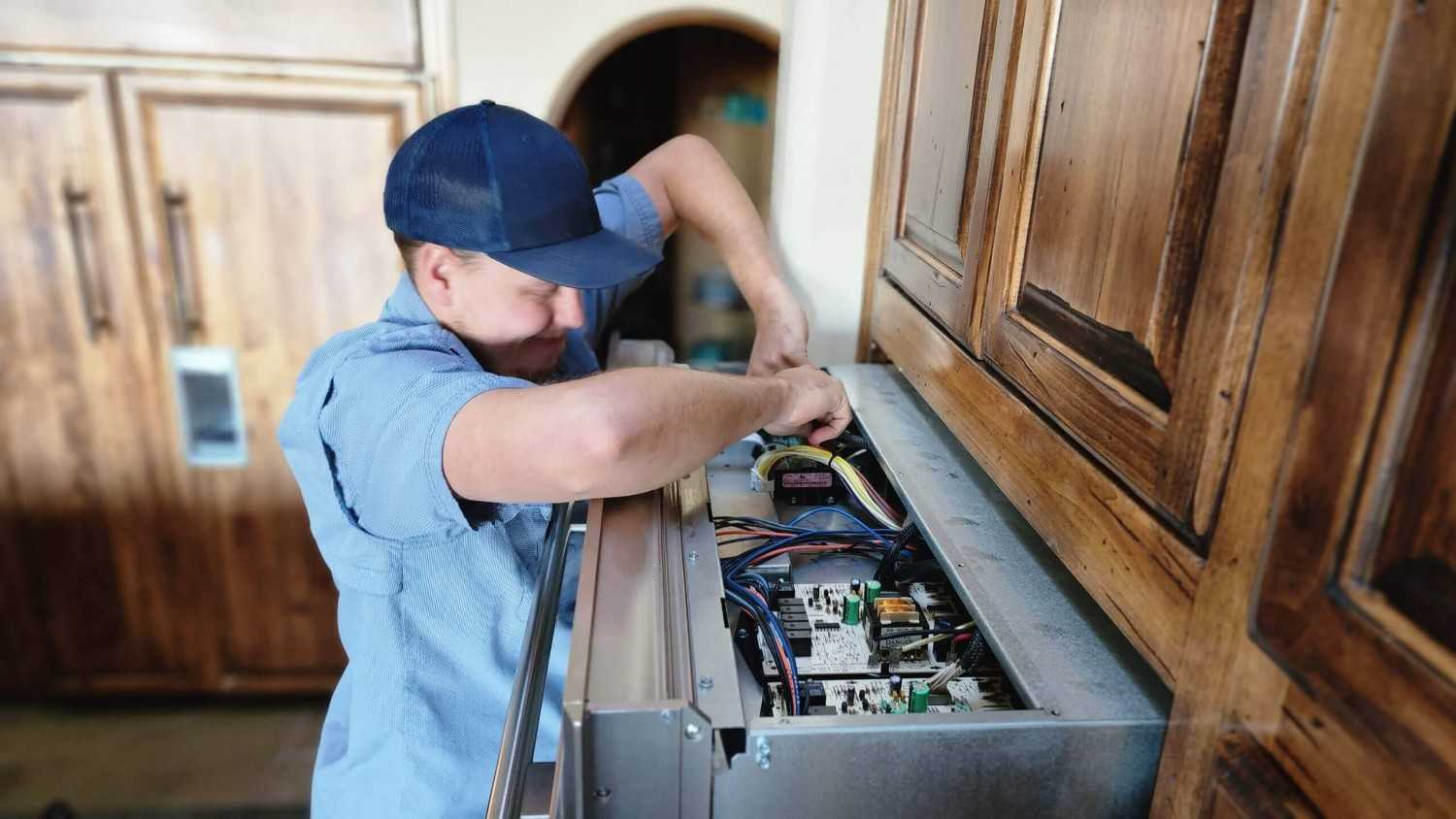dishwasher-control-panel Technician repairing fireplace control panel in the home in Gilbert & Fountain Hills, AZ <br />