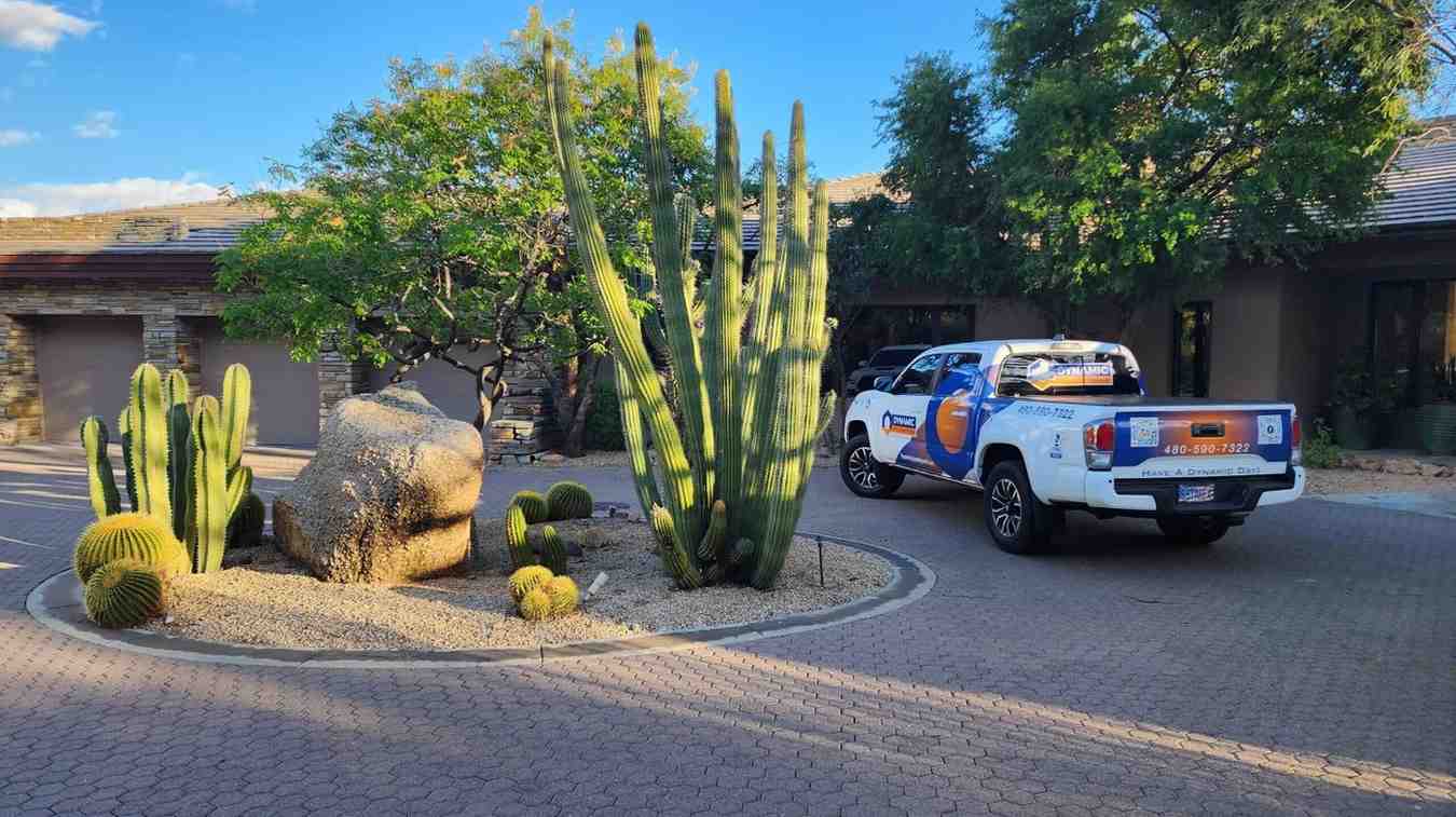 Service truck parked at a desert-style home driveway in Gilbert & Fountain Hills, AZ<br />
