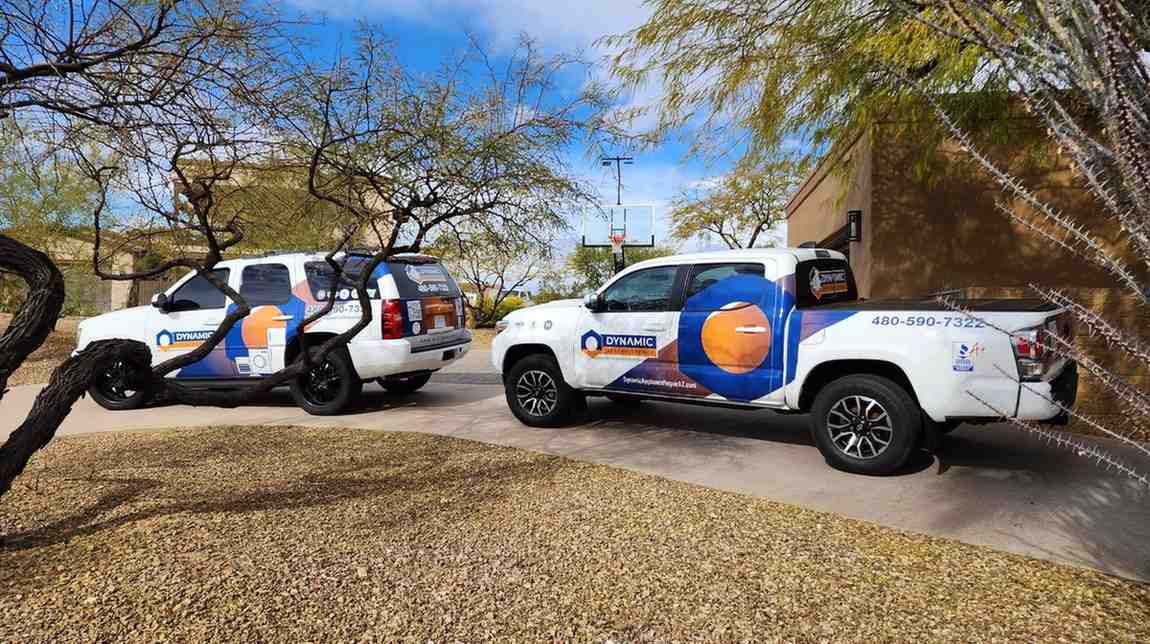 Two Dynamic service trucks are parked in the driveway near Gilbert and Fountain Hills, AZ<br />
