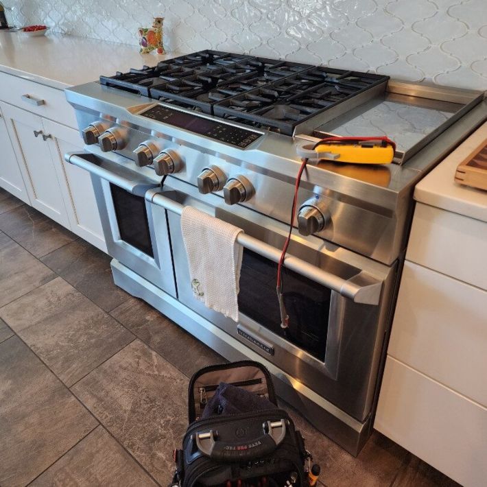 gas-range-diagnostic-tools Stainless steel gas range with diagnostic tools in a kitchen in Gilbert & Fountain Hills, AZ<br />